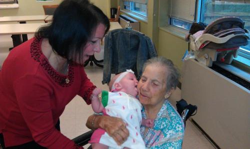 Gabbie kissing Great Grandma Teresa Leo
