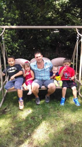 Joey Swinging with his Kids